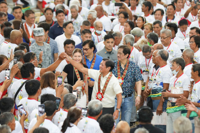 PBBM leads distribution of land condonation certificates to farmers in Tarlac.