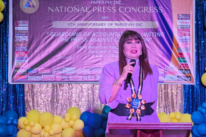 PCSO's Imelda Papin highlighted the press's watchdog function and the perils of the digital age.