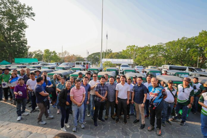 Gov. Christian Yap leads the distribution of 26 tuk-tuks to Tarlac barangays. (Image Credited: Christian Yap/FB)