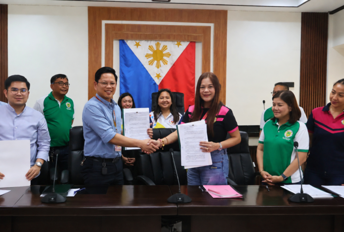 Mayor Joyce Agustin and TSU President Dr. Jasper Jay N. Mendoza lead the MOA signing for Project START+, strengthening child development workers in Santa Ignacia. (Photo: Center for Community and Local Governance Studies and Policy Development/FB)