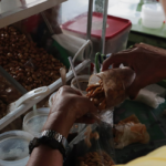 "Maning Concepcion," a perfectly deep-fried, flavor-preserved delicacy that remains the undisputed king of local snacks.