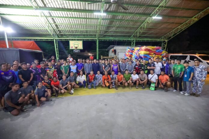Tarlac Governor Christian Yap and Tarlac City Mayor Susan Yap joins local officials, uniformed personnel, and volunteer responders during a late-night briefing at the Provincial Disaster Risk Reduction and Management Office